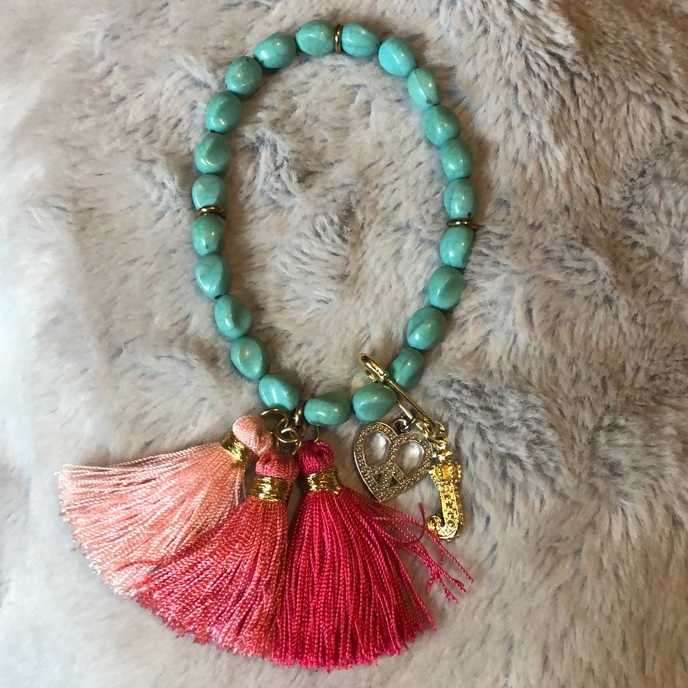 Juicy couture blue and pink tassel bracelet with charms